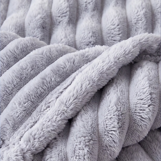 Midnight and Star heavyweight blanket in blue grey, folded, showing the ribbed faux fur