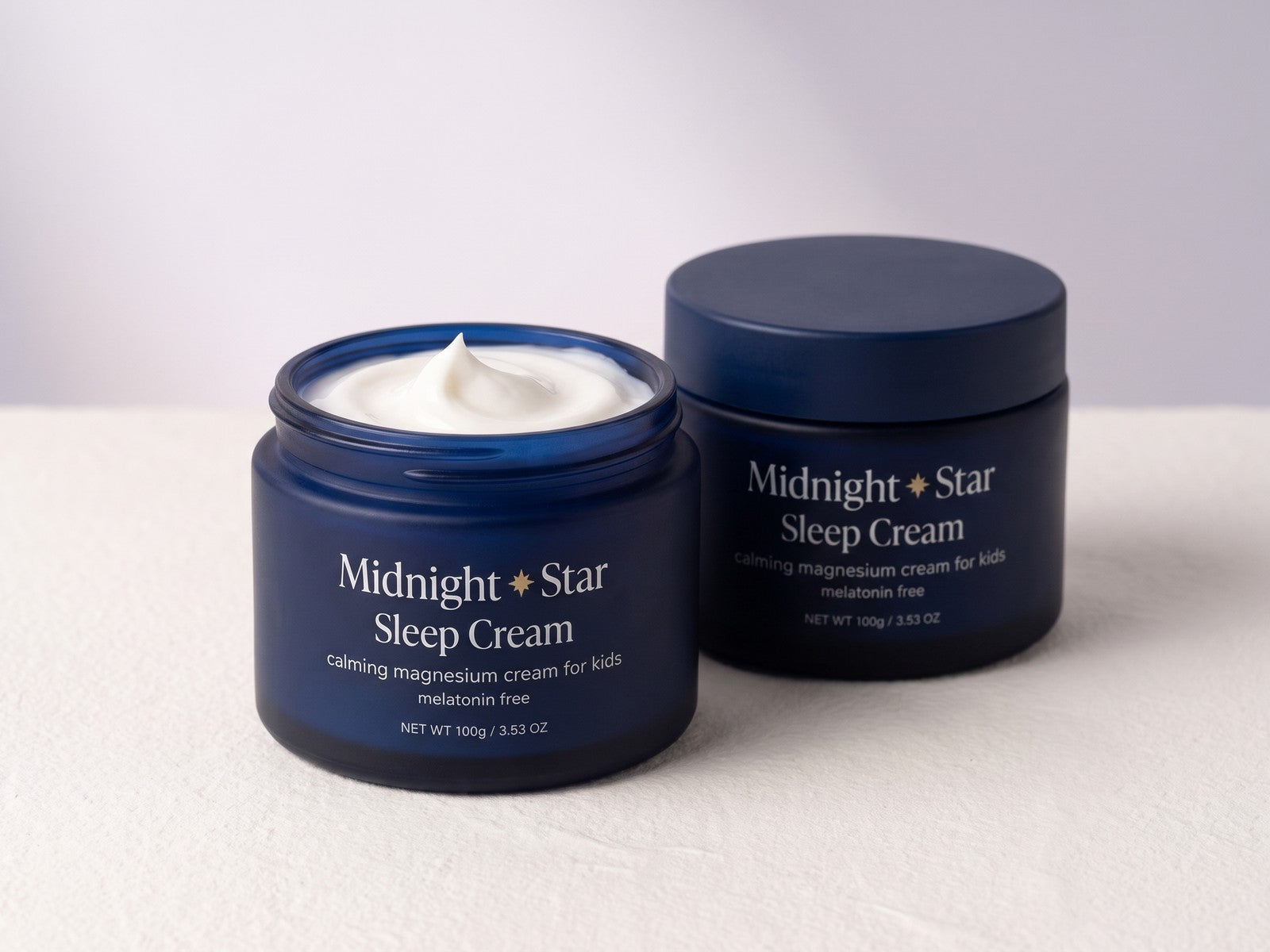 Midnight and Star Sleep Cream, two jars, one open