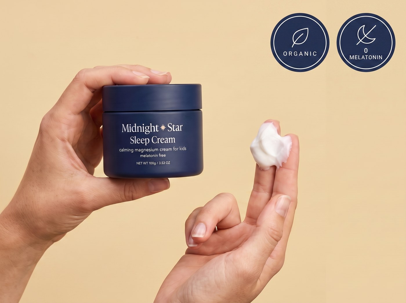 One hand holding a tub of Midnight & Star Sleep Cream, the other with a scoop of the cream on its fingertips